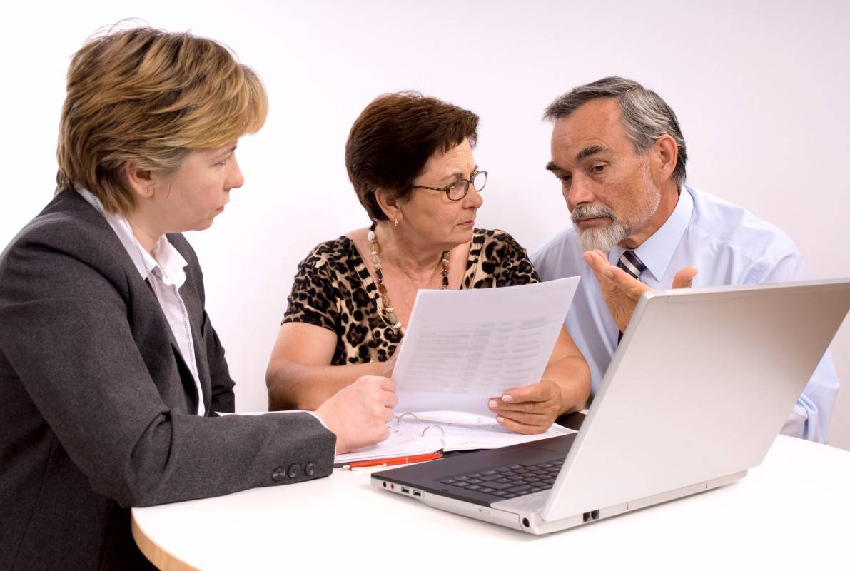 Senior couple meeting with financial advisor