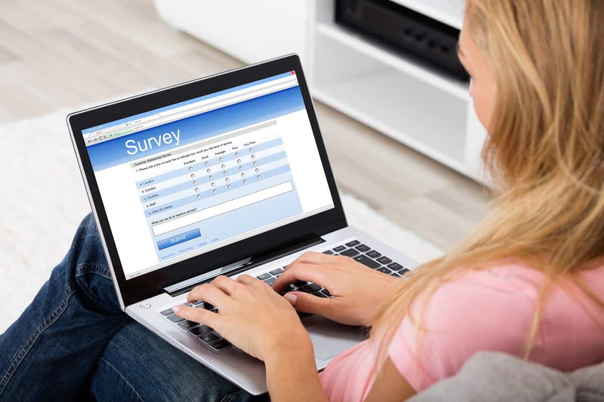 Woman completing online survey 