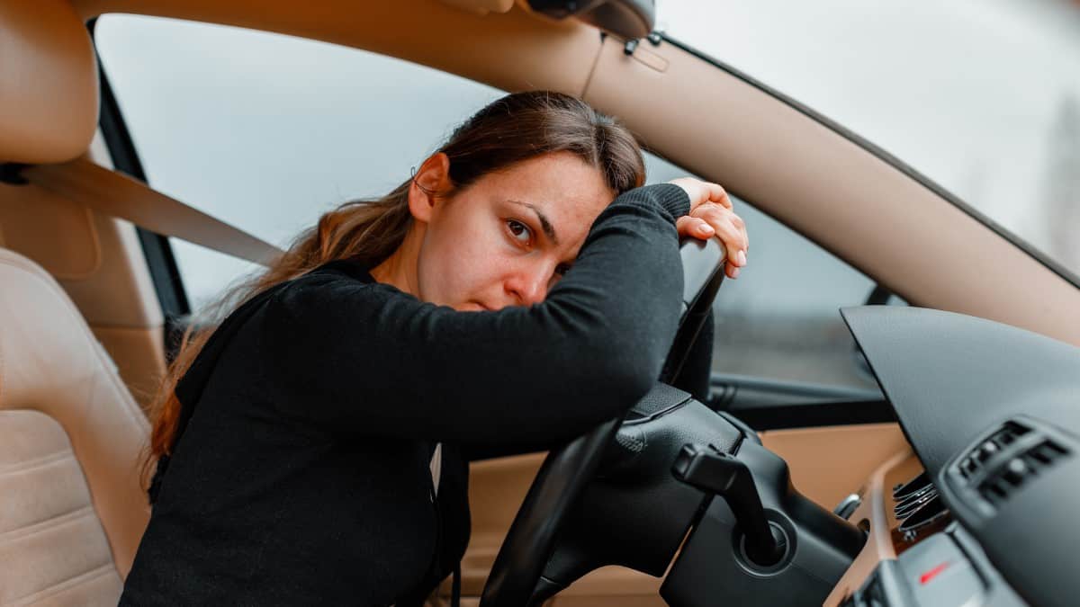 Stressed lady in car 