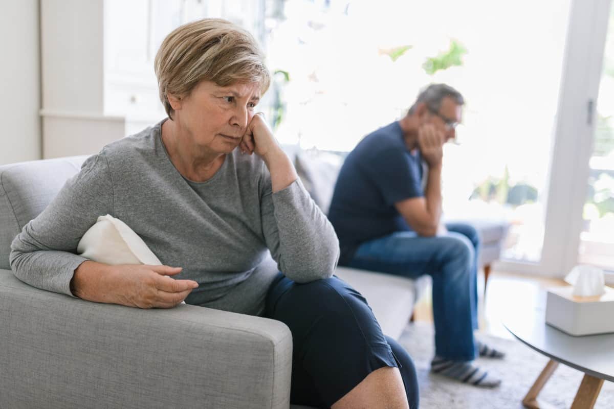 Seniors Brace for Another Social Security Letdown as 2026 COLA Prediction Signals Trouble Ahead 16 Upset senior couple at home in living room having an argument