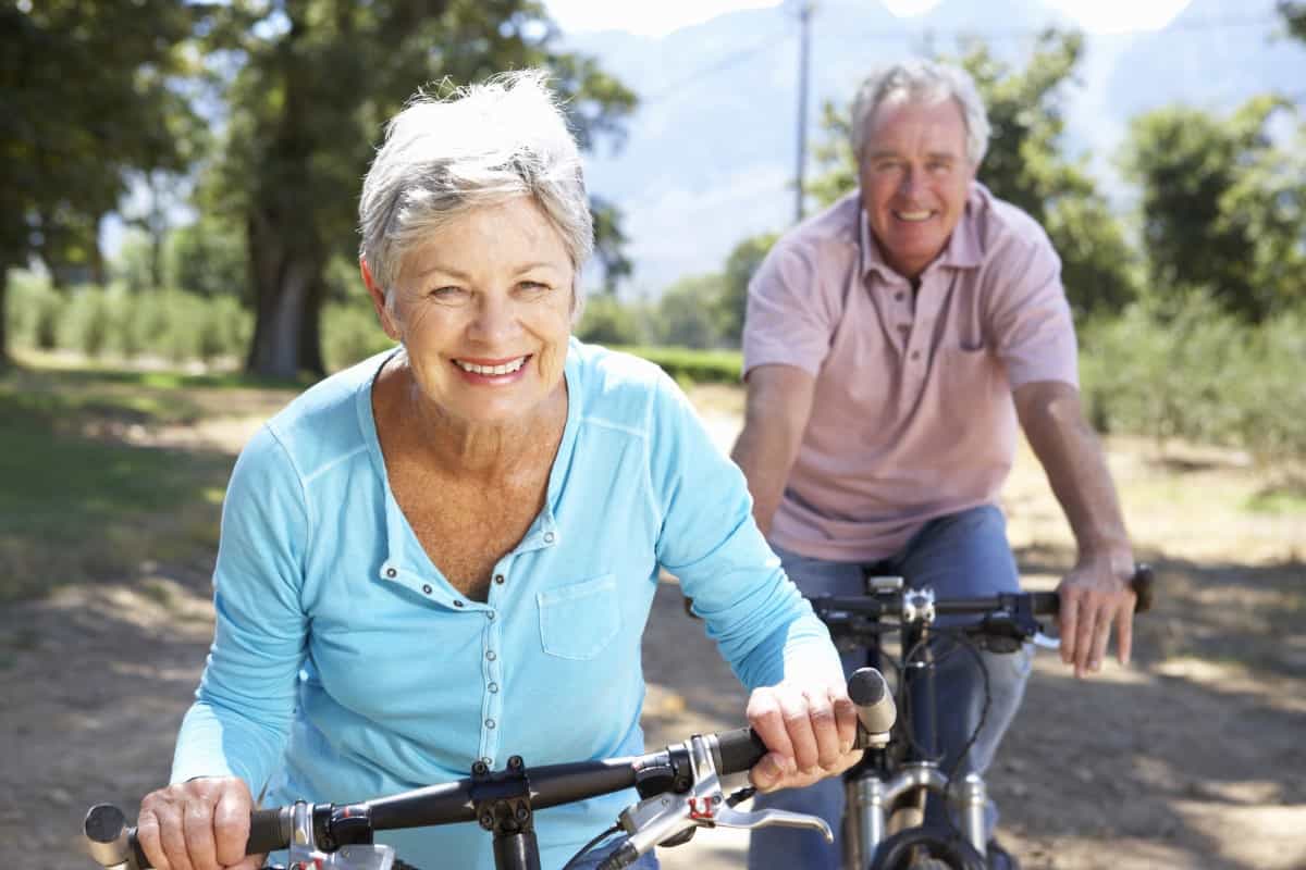 Senior couple on country bike ride 