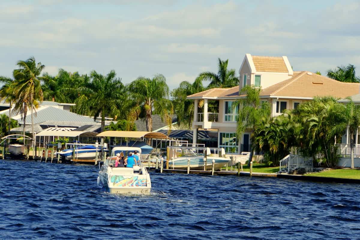 Cape Coral, Florida, U.S.A - December 3, 2018 - The view of the boat and waterfront home by the bay