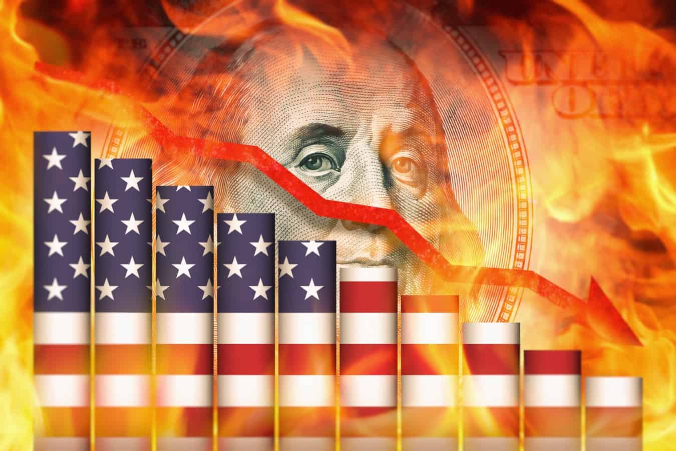 Recession and inflation in US economy. Financial crisis, bankruptcy of banks. Red arrow going downwards above US business graph in front of 100 dollar bill and flames. Economists forecast for the United States.