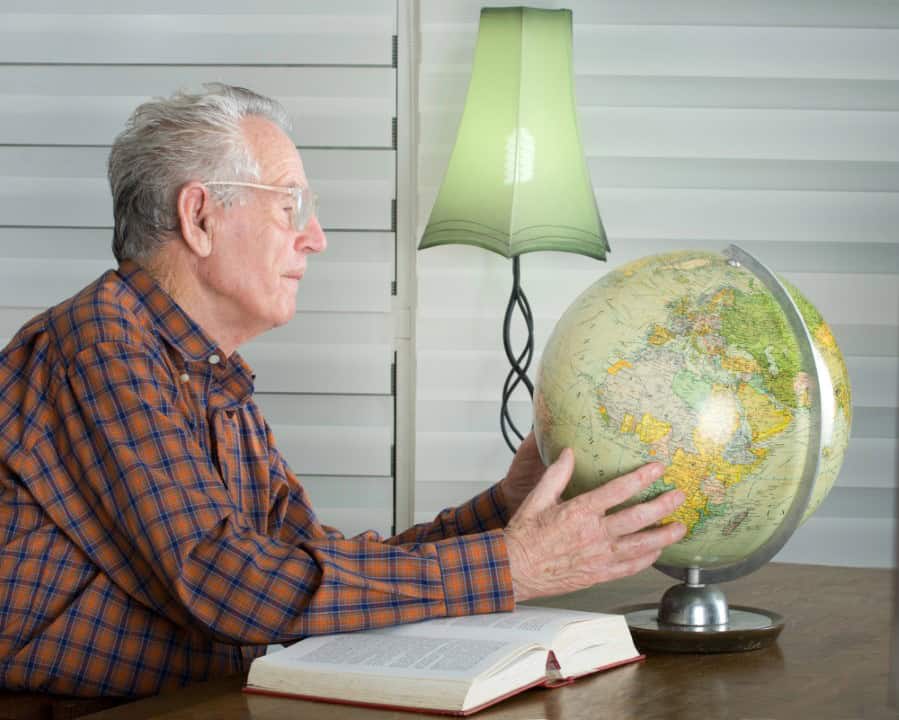 Old man with a globe