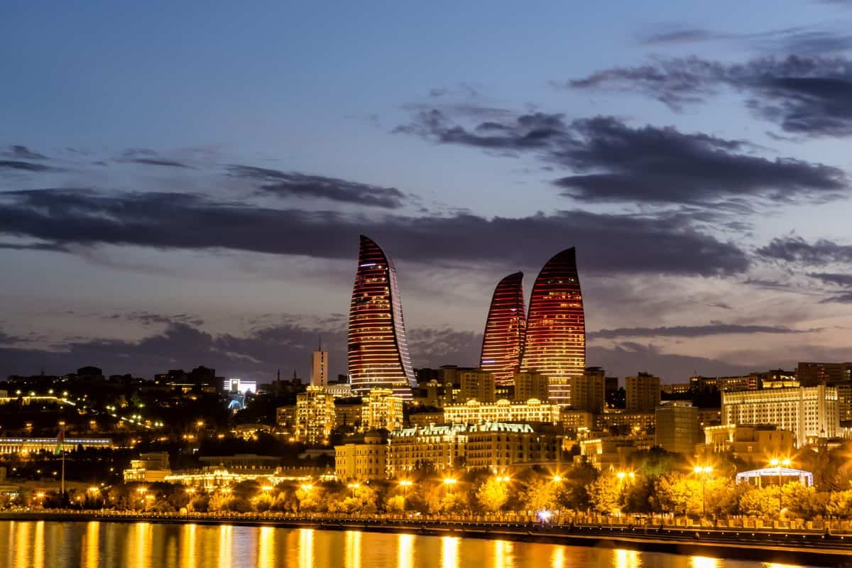 View of the waterfront and the city at night, in Baku, Azerbaijan. vintage tone filter