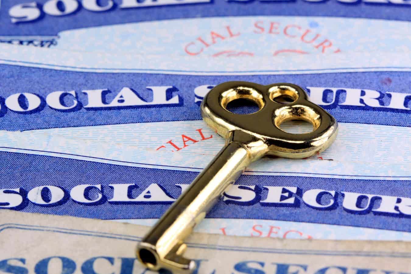 Social Security Cards with Key To The Golden Years of Retirement