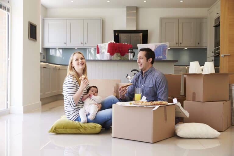 Family Celebrating Moving Into New Home