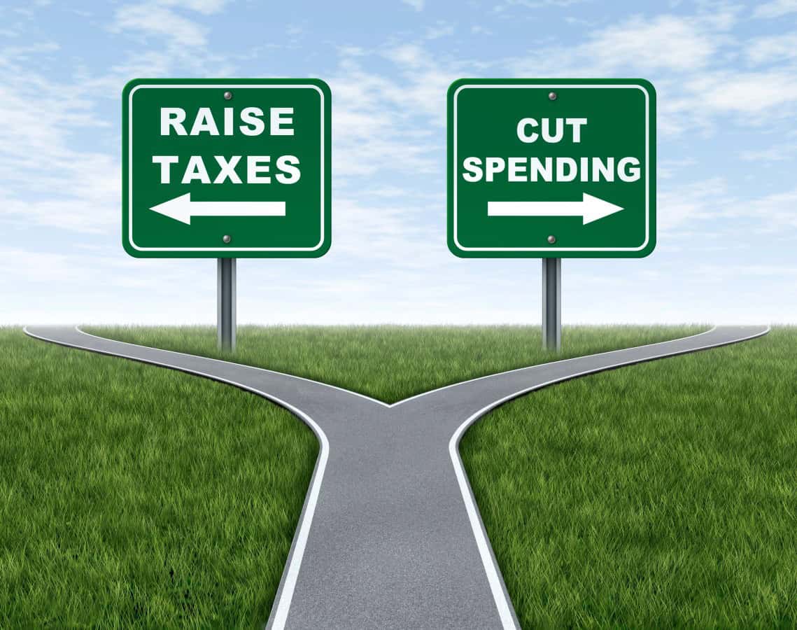 Raising taxes or cutting spending