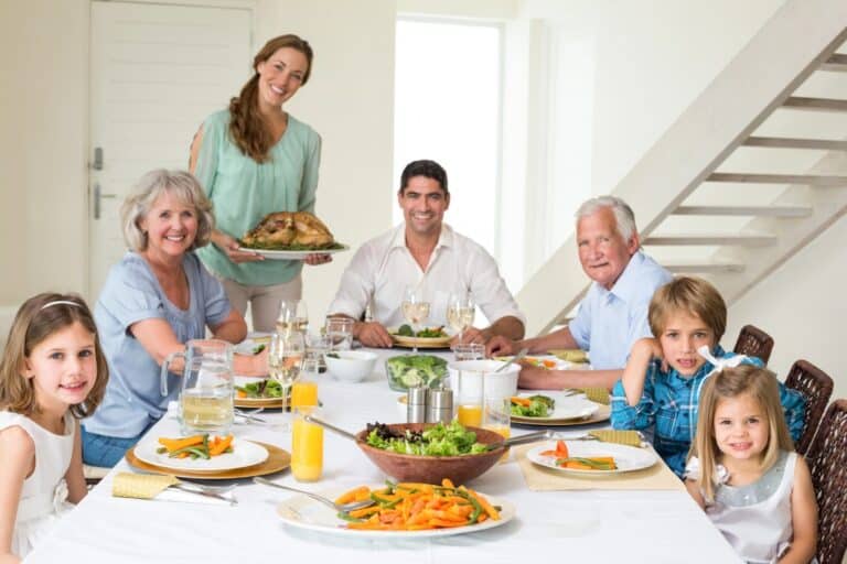 Multi-generational Family at a dining table for holiday dinner