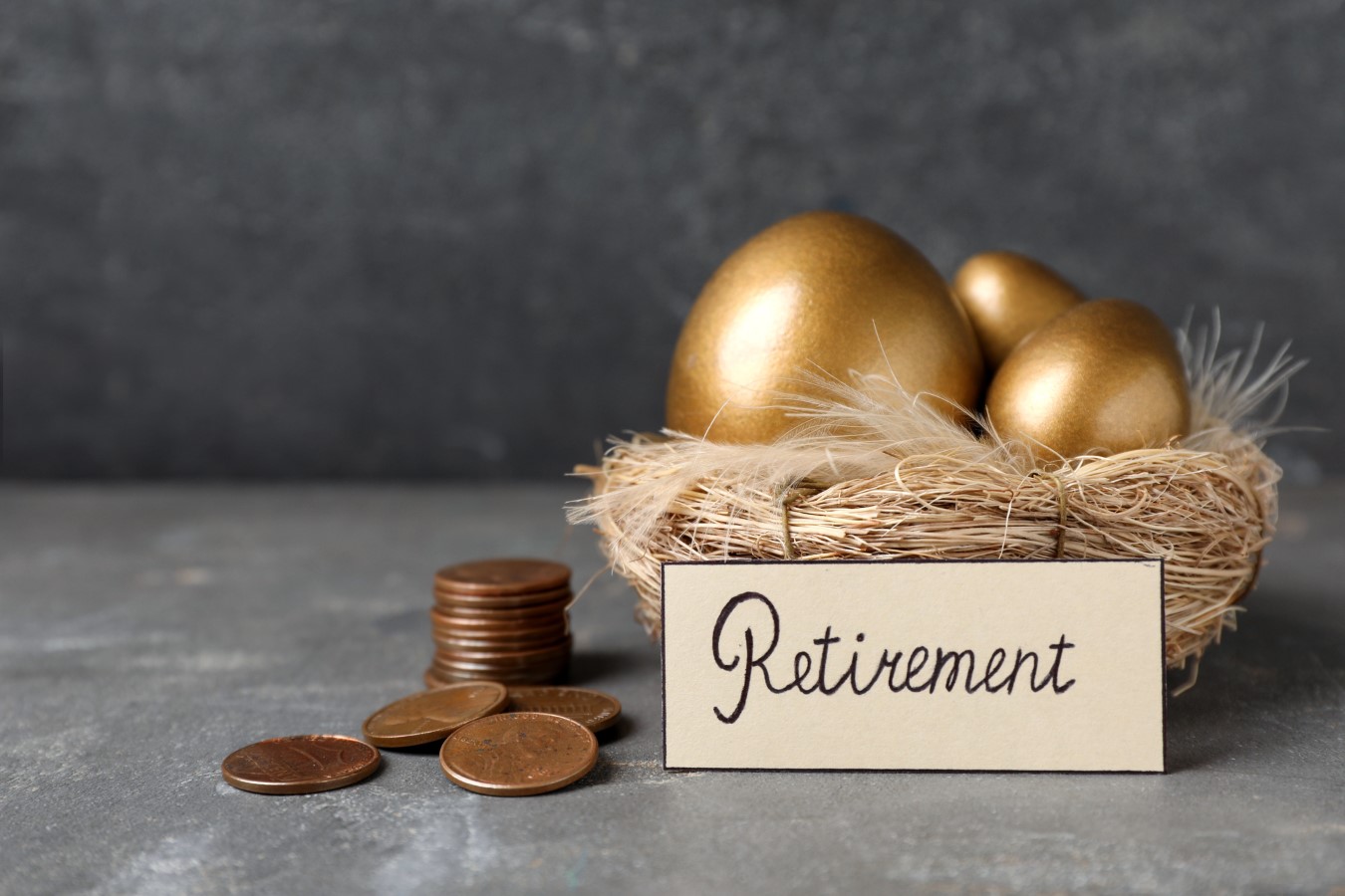 Crypto in Your 401(k)? New Rule Opens the Door, But Retirees Should Think Twice 1 Many golden eggs, coins and card with word Retirement