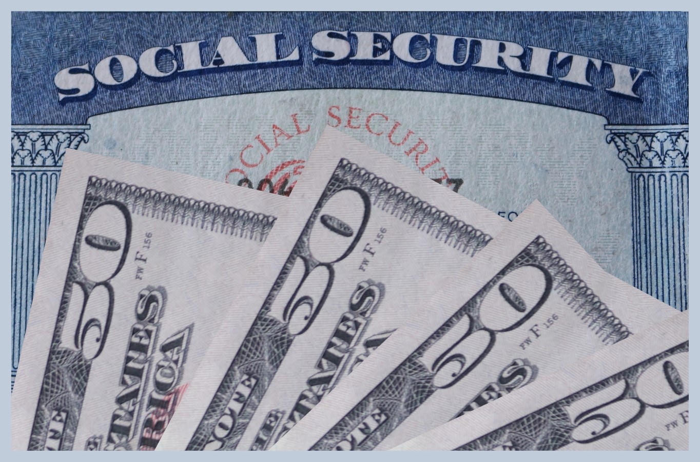 Social security card with a display of fifty dollar bills