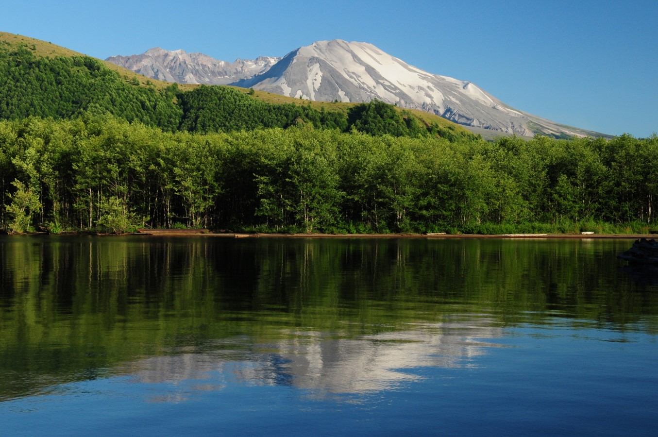 Zillow’s Creepy-Cute List Of 13 American Towns Where Halloween Never Ends 6 Coldwater Lake Reflecting Mount St. Helens Oregon USA