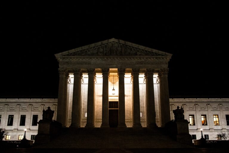 A night view of the Supreme Court Building in Washington, United States