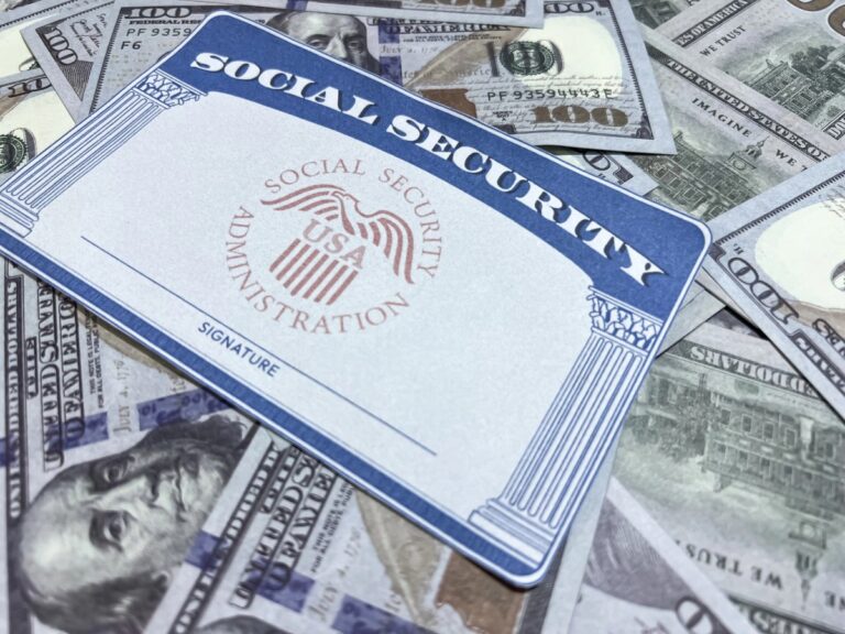 Social Security Card with American dollar under it