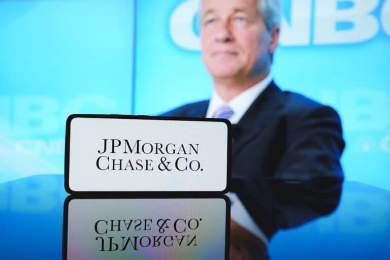 JPMorgan Chase logo in front of company CEO Jamie Dimon